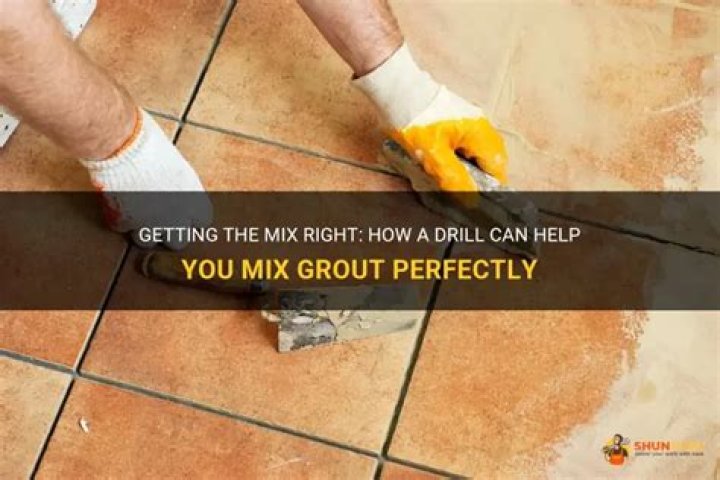 Do i mix grout by hand or drill?