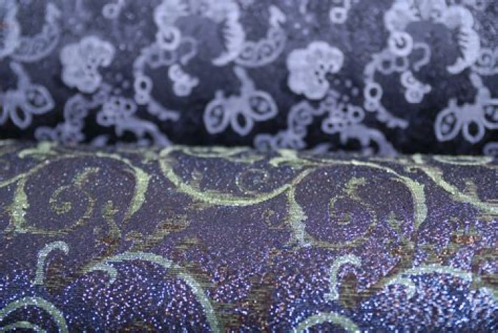 How is damask produced?