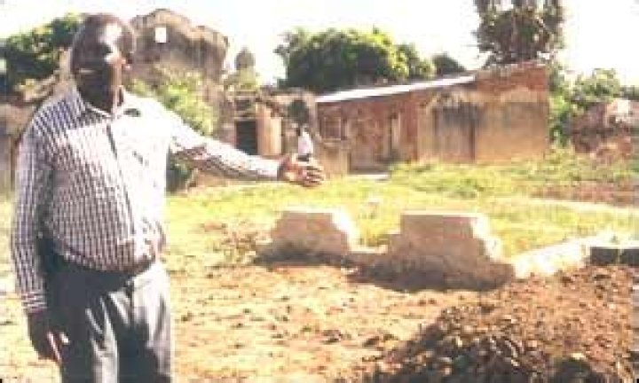 Was amin buried in uganda?